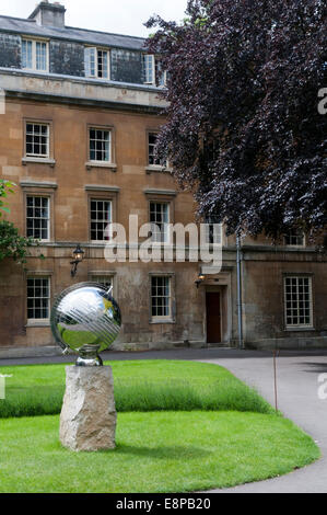 This sundial in Balliol College quad, celebrates the 30th anniversary of women entering the college. Stock Photo