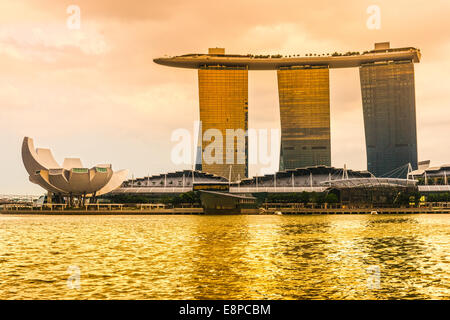 SINGAPORE-MARCH 21: The 6.3 biliion dollar (US) Marina Bay Sands Hotel dominates the skyline at Marina Bay behind the  Esplanade Stock Photo