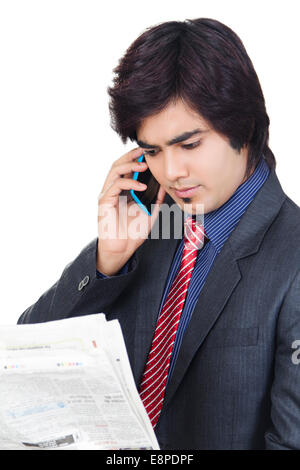 indian businessman reading Newspaper Stock Photo
