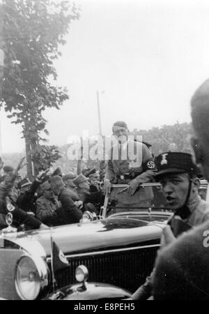 Nuremberg Rally 1933 in Nuremberg, Germany - Adolf Hitler in his car amongst members of the SA (Sturmabteilung) at the Nazi party rally grounds. (Flaws in quality due to the historic picture copy) Fotoarchiv für Zeitgeschichtee - NO WIRE SERVICE – Stock Photo