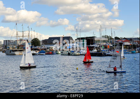 Bristol City Docks have become a tourist and activity area. Sail boats in harbour by marina. UK Stock Photo