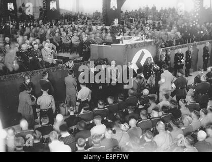 Nuremberg Rally 1933 in Nuremberg, Germany - Opening of the party congress in Luitpold Hall at the Nazi party rally grounds by Rudolf Hess. Behind Hess in the first row on the left: Adolf Hitler. (Flaws in quality due to the historic picture copy) Fotoarchiv für Zeitgeschichtee - NO WIRE SERVICE - Stock Photo