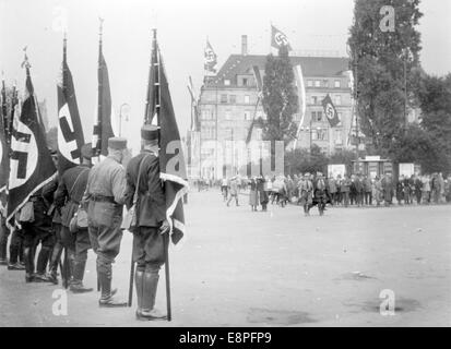 Nuremberg Rally 1933 in Nuremberg, Germany - Office holders of the NSDAP with their flags in front of the Grand Hotel in Nurember, where the government has taken quarters. (Flaws in quality due to the historic picture copy) Fotoarchiv für Zeitgeschichtee - NO WIRE SERVICE - Stock Photo