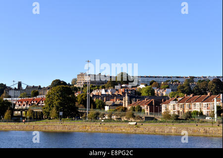 Houses in Hotwells and Clifton on hillside above Bristol City Docks flouting harbour Cumberland Basin, UK Stock Photo