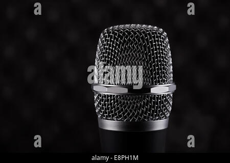 wireless microphone with a black handle on a white background Stock Photo -  Alamy