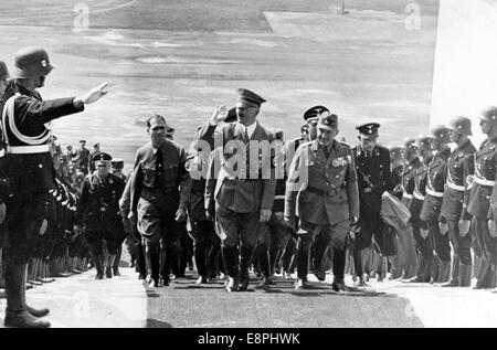 Nuremberg Rally 1937 in Nuremberg, Germany - Arrival of Adolf Hitler for the roll call of the Reich Labour Service (RAD) at Zeppelin Field on the Nazi party rally grounds. Left of Hitler Reich Minister Rudolf Hess, right of Hitler head of the RAD Konstantin Hierl. (Flaws in quality due to the historic picture copy) Fotoarchiv für Zeitgeschichtee - NO WIRE SERVICE - Stock Photo