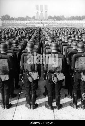 Nuremberg Rally 1938 in Nuremberg, Germany - Great roll call of the Sturmabteilung (SA), Schutzstaffel (SS), National Socialist Motor Corps (NSKK) and National Socialist Flyers Corps (NSFK) at Luitpoldarena at the Nazi party rally grounds. Flaws in quality due to the historic picture copy) Fotoarchiv für Zeitgeschichtee - NO WIRE SERVICE - Stock Photo