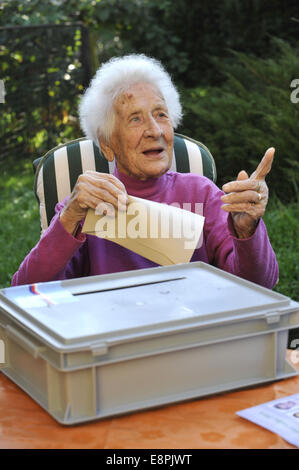 The oldest citizen of Czech Republic Vlastimila Ceskova 109 years old is from Jarcova in Vsetinsko. She casts her vote during municipal and senate elections. October 11, 2014. (CTK Photo/Dalibor Gluck) Stock Photo