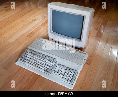 A view of a Commodore Amiga 500 computer and a Commodore 1084S computer monitor. Stock Photo