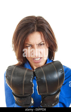 angry and confident young business or casual woman in boxing concept, boxing gloves leaning on each other Stock Photo