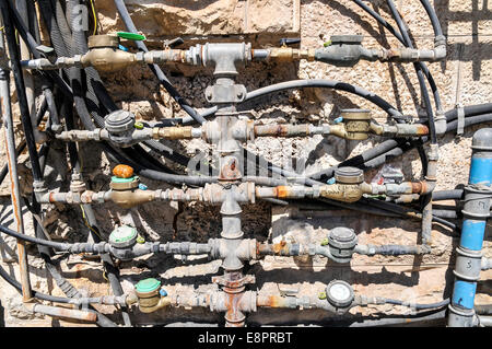 rusty and corroded water mains in domestic building. Photographed in Jerusalem, Israel Stock Photo