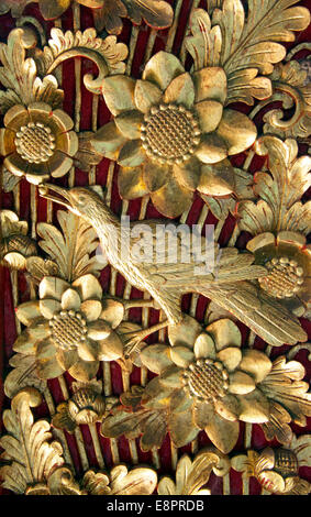 Intricate gold carved doors Balai Banjar Temple Ubud Kelod Bali Indonesia Stock Photo