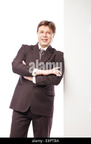 Man leaning against empty board isolated Stock Photo