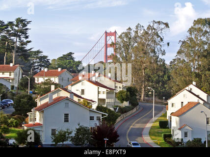 view of the Presidio of San Francisco military housing with the golden gate brige south tower in backgrounmd Stock Photo
