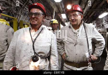 Marl, Germany. 13th October, 2014. German Football Association (DFB) President Wolfgang Niersbach and secretary general Helmut Sandrock (L) visit the coal mine «Auguste Victoria» in the western German town of Marl October 13, 2014. © dpa picture alliance/Alamy Live News Stock Photo