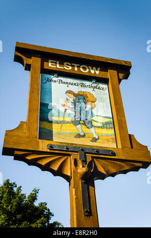 Village sign in ELSTOW Bedfordshire dedicated to John Bunyan Stock Photo