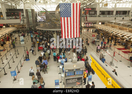 International airline ticket counters in the departures area at JFK Airport in New York City. Stock Photo