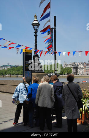 group of woman finding their way on the South Bank London UK Stock Photo