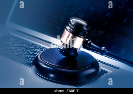 Gavel on Computer - cyber law crime concept image. Stock Photo