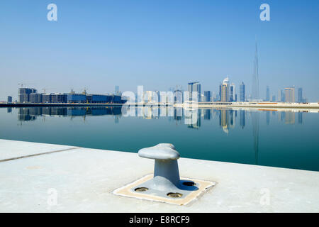 View across The Creek towards skyline of Dubai and Burj Khalifa at Business Bay in United Arab Emirates Stock Photo