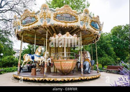 France, Bordeaux. Carousel in Le Jardin Publique. Stock Photo