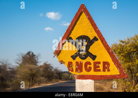 Danger road sign with skull and crossbones Stock Photo