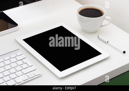 Workplace with tablet and keyboard, pen Stock Photo