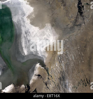 For decades, Landsat satellites have documented the desiccation of the Aral Sea in Central Asia. Once one of the largest seas in the world, it shrunk to a tenth of its original volume after Russia diverted its feeder rivers in the 1960s. Scientists studyi Stock Photo