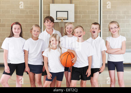 Pupils In Elementary School Basketball Team Stock Photo