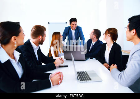 Businesspeople sitting at the table on a meeting Stock Photo