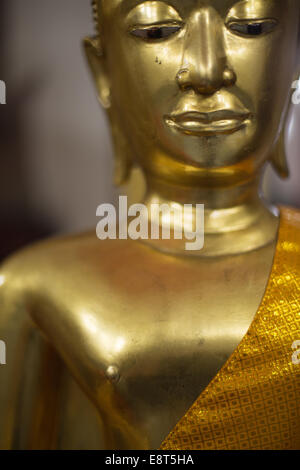 Portrait of Buddha in one of the temples of Wat Pho, Bangkok, Thailand. Stock Photo