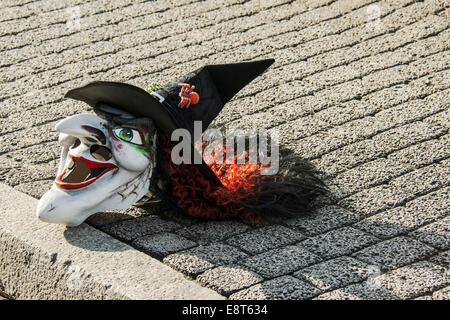 Mask lying in the street during a carnival parade, traditional carnival celebrations in Basel, Switzerland Stock Photo