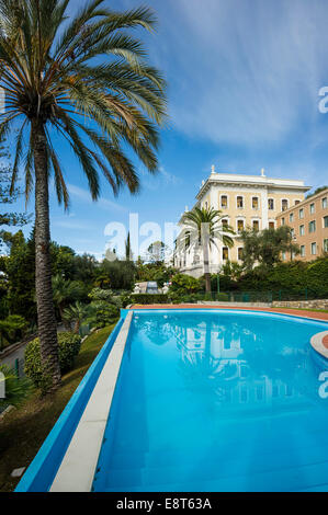 Swimming pool in front of villa, Fondazione Terruzzi, Villa Regina Margherita, Bordighera, Imperia, Riviera dei Fiori, Liguria Stock Photo