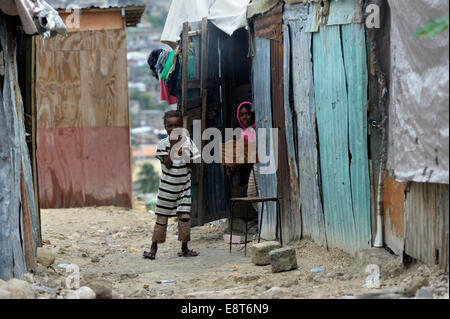 Children in front of a shack, Fort National slum, Port-au-Prince, Haiti Stock Photo