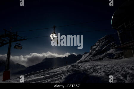 Skiers in chairlift, Zugspitze, Bavaria, Germany Stock Photo