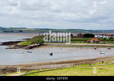 The view from the castle towards the harbour on the island of Lindisfarne (Holy Island), North East England. Stock Photo