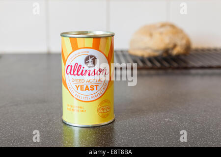 Can of Allinson Dried Active Yeast on a kitchen surface Stock Photo