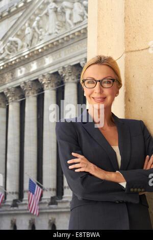 Caucasian businesswoman standing in city, New York City, New York, United States Stock Photo