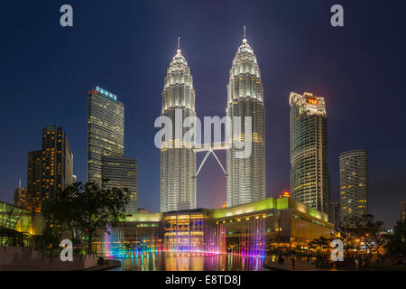 Illuminated skyscrapers in Kuala Lumpur city skyline, Kuala Lumpur, Malaysia Stock Photo