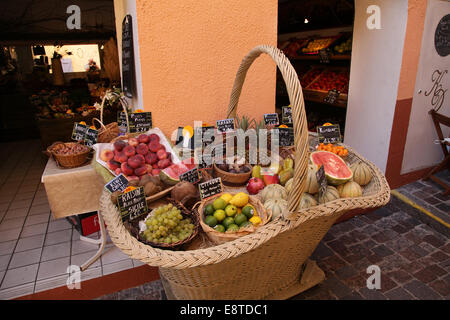 Mediterranean and Tropical fruit in a huge reed basket.Tropic.South of Europe.The French Riviera Stock Photo