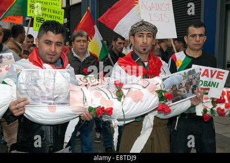 'Save Kobane' & Protect humanity protesters; A protest march  through Liverpool city centre to demonstrate against terrorist group ISIS. Around 300 Kurdish people marched along Church Street, Bold Street and Renshaw Street before picketing outside Lime St Station. Sabiha Soylu took part in the march because she feels more needs to be done to help Kurdish fighters - who are battling with heavily-armed ISIS mililtants. Stock Photo