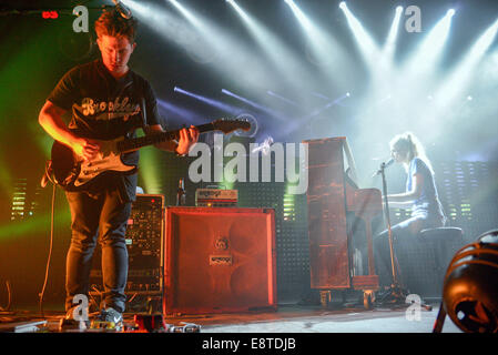 Berlin, Germany. 05th Oct, 2014. Singer Hannah Reid (R) and guitarist Dan Rothman from the British band London Grammar perform in the Columbiahalle in Berlin, Germany, 05 October 2014. Photo: Jason Harrell/dpa/Alamy Live News Stock Photo