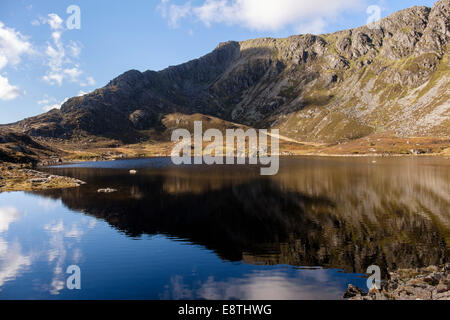 View across Llyn Y Foel lake reflecting Daear Ddu east ridge to Carnedd Moel Siabod mountain summit in Snowdonia National Park (Eryri) Wales UK Stock Photo