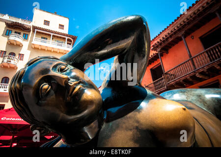 Statue of a fat woman reclining by Fernando Botero in the Plaza de Santo Domingo, Cartagena de Indias, Colombia Stock Photo