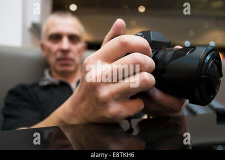 Male paparazzi photographer Stock Photo