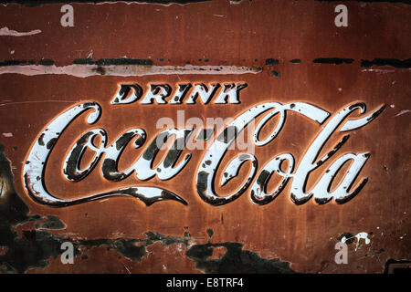 A vintage and rusted Drink Coca-Cola sign. Stock Photo