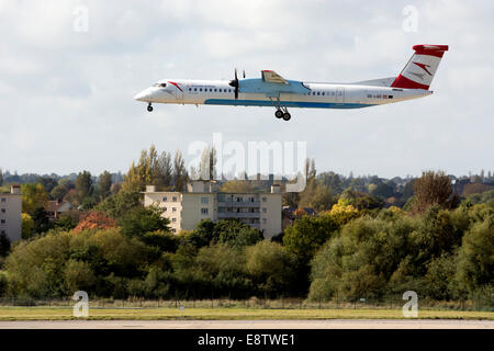 Brussels Airlines DHC Dash 8 aircraft landing at Birmingham Airport, UK Stock Photo