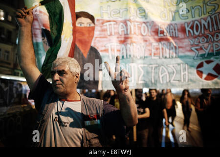 Thessaloniki, Greece. 14th October, 2014. Kurds living in Greece protest in Thessaloniki during pro-Kurd demonstration against attacks launched by Islamic State insurgents targeting the Syrian city of Kobane in Thessaloniki, Greece on Oct. 14, 2014. Credit:  Konstantinos Tsakalidis/Alamy Live News Stock Photo