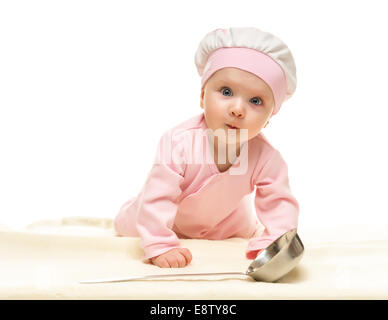 Little baby cook with metal ladle on white background Stock Photo