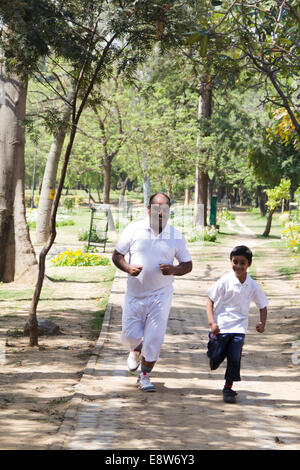 1 Indian Man Morning Walk With kid Stock Photo